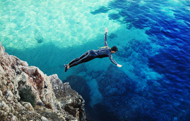 Enjoy some cliff diving at the Flag Rock